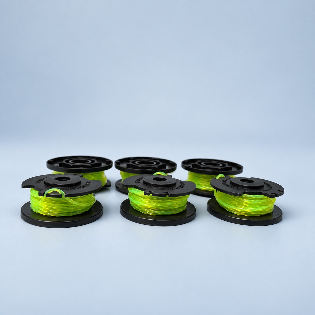 6x Żyłka do podkaszarki Ryobi 18V + osłony — aranżacja poglądowa AI 2